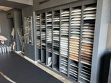 a room with a lot of papers on the shelves