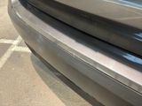a close up of a car ' s front bumper