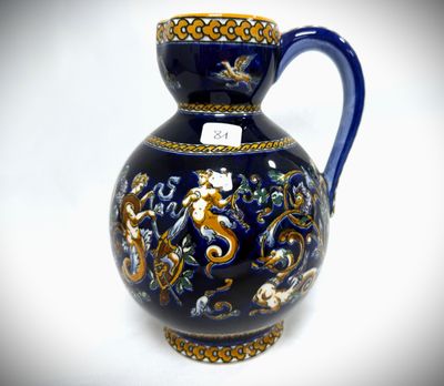 a blue vase with a gold and blue design on it