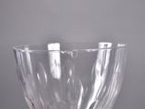 a clear glass vase sitting on top of a table