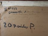 a brown box with writing on it sitting in a room