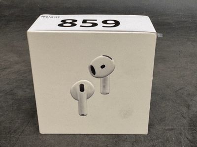 a box with a pair of airpods in it