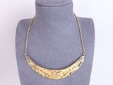 a close up of a necklace on a mannequin mannequin