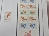 a picture of a sheet of stamps with a picture of a man on it