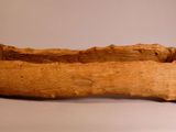 a wooden boat that is sitting on a table