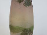 a vase that has a picture of a tree on it