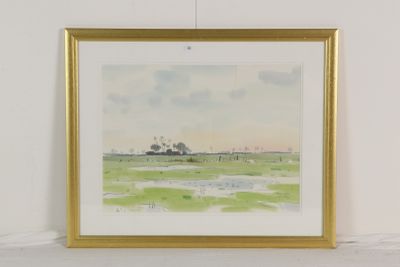 aquarelle encadrée représentant un paysage avec une maison au loin