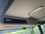 a picture of a car dashboard with a remote control