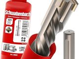a close up of a drill bit and a piece of metal