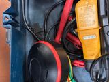 a blue box with a bunch of electrical tools in it