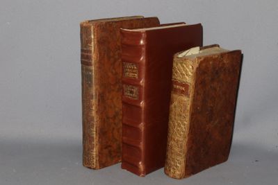 two books that are sitting next to each other on a table