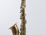 a close up of a saxophone on a white background