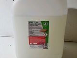 a container of liquid sitting on a table