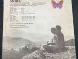 an old album with a picture of a man and a butterfly on it