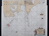 une vieille carte du monde sur laquelle figurent des bateaux et des personnages