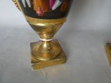 a vase that is sitting on a stand on a table