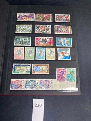 a display of stamps on display in a glass case