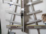 a ladder leaning up against a wall in a garage