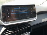 a car dashboard with a cell phone in it