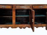 a wooden cabinet with two doors open on a white background