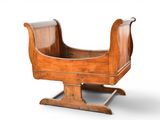 an old wooden sleigh with a sleigh on top of it