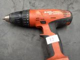 a drill that is sitting on a table