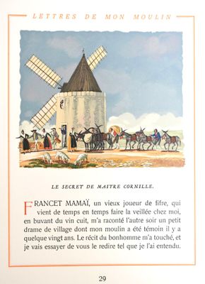 une photo d'un livre avec une image de moulin à vent en arrière-plan