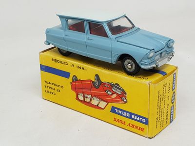 a toy car that is sitting on top of a box