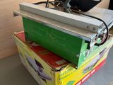 two boxes stacked on top of each other on a table