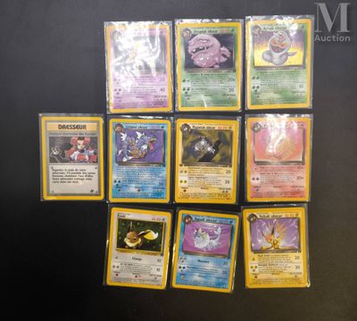 the pokemon cards are lined up on a black surface