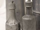 three bottles sitting next to each other on a table