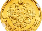 a close up of a gold coin on a white background