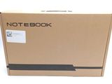 a box with a note book on it sitting on a table