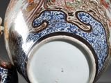 a cup and saucer sitting next to each other on a table