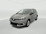 the grey car is parked in a white room with a white floor