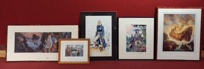 a lot of framed art on the wall in this room