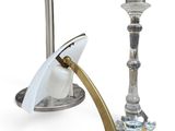 two candles and a candle holder on a white background