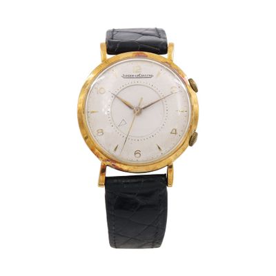 an image of a watch with a white dial and black leather strap