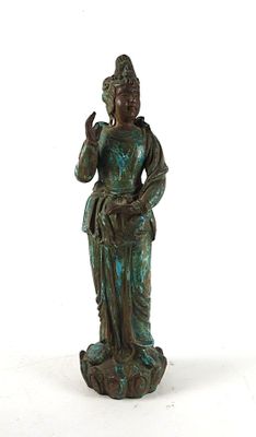 an image of a statue of a woman holding a flower in her hand