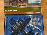 a toy airplane that is in the box on the table