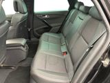 the back seats of a car are empty with no one in it