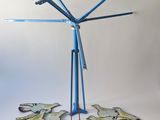 a sculpture made out of paper and scissors on a table