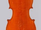 an old violin with a wooden back and a wooden bow