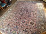 an image of a large oriental rug in a living room
