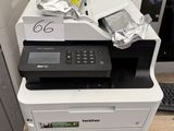 a printer that is sitting on top of a pallet
