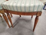 a chair that has a striped seat on it
