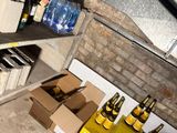 many bottles of beer on the shelves in the room
