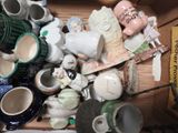 a wooden box filled with many different types of vases