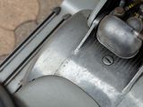 a close up view of a motorcycle engine with a gas tank