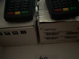 two phones that are sitting on top of a box